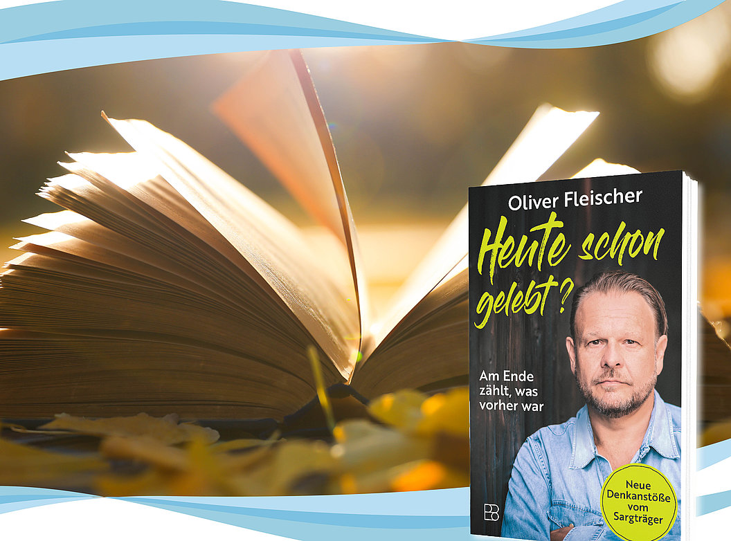 Aufgeschlagenes Buch mit sich bewegenden Seiten und Buchcover von Oliver Fleischer mit dem Titel 'Heute schon gelebt'
